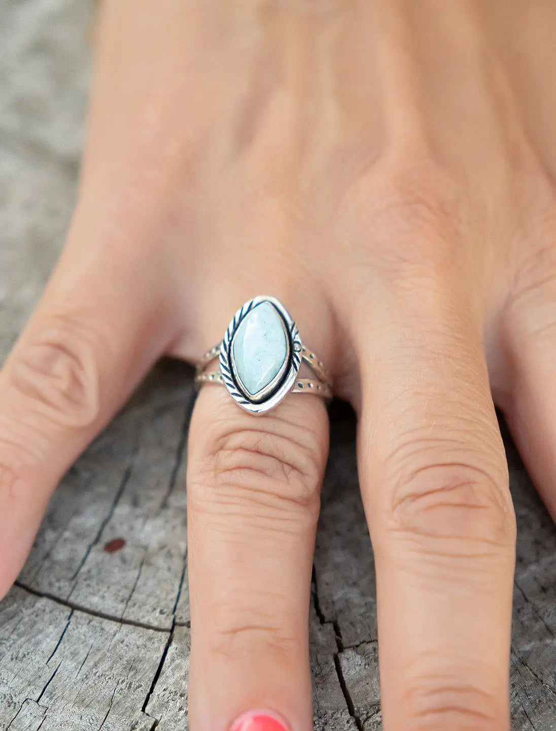 Women's ring in silver drop with Greeks order and Larimar stone